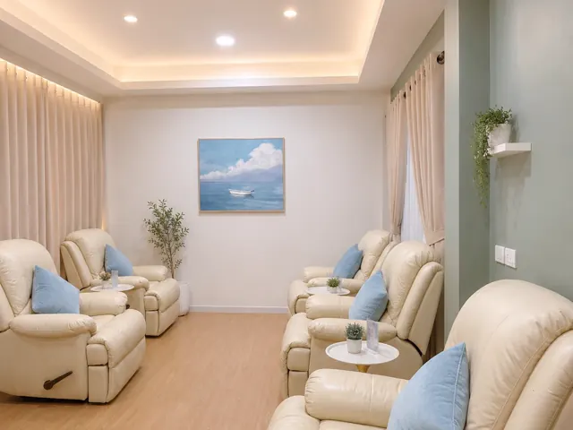 The ARPAR therapy lounge, with cream reclining chairs and side tables